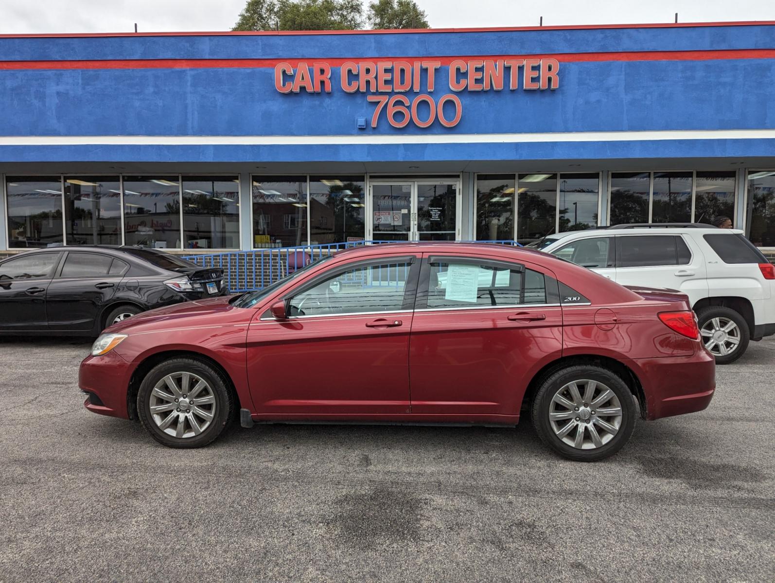 2013 RED Chrysler 200 Touring (1C3CCBBBXDN) with an 2.4L L4 DOHC 16V engine, 6-Speed Automatic transmission, located at 7600 S Western Ave., Chicago, IL, 60620, (773) 918-3980, 0.000000, 0.000000 - Unable to interpret response, please check raw response - Photo #0