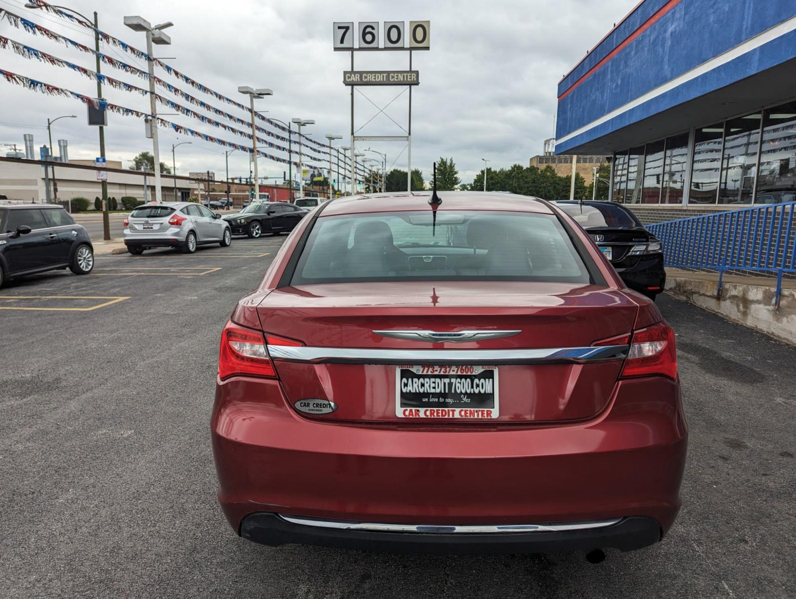 2013 RED Chrysler 200 Touring (1C3CCBBBXDN) with an 2.4L L4 DOHC 16V engine, 6-Speed Automatic transmission, located at 7600 S Western Ave., Chicago, IL, 60620, (773) 918-3980, 0.000000, 0.000000 - Unable to interpret response, please check raw response - Photo #3