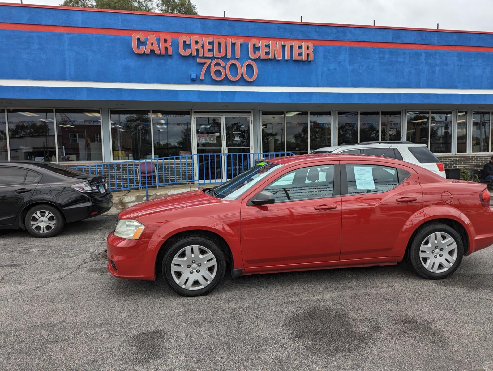 2013 RED Dodge Avenger Base (1C3CDZAB4DN) with an 2.4L L4 DOHC 16V engine, 4-Speed Automatic transmission, located at 7600 S Western Ave., Chicago, IL, 60620, (773) 918-3980, 0.000000, 0.000000 - Photo #1