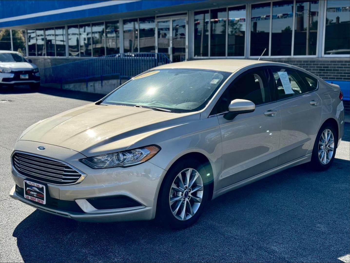 2017 GOLD FORD FUSION SE SE (3FA6P0HD1HR) with an 1.5L L4 DOHC 16V engine, 6A transmission, located at 7600 S Western Ave., Chicago, IL, 60620, (773) 918-3980, 0.000000, 0.000000 - Photo#1