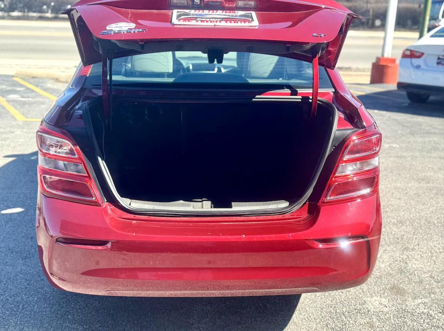 2019 RED Chevrolet Sonic LT Manual Sedan (1G1JD5SB2K4) with an 1.4L L4 DOHC 24V TURBO engine, 5M transmission, located at 7600 S Western Ave., Chicago, IL, 60620, (773) 918-3980, 0.000000, 0.000000 - Photo#4