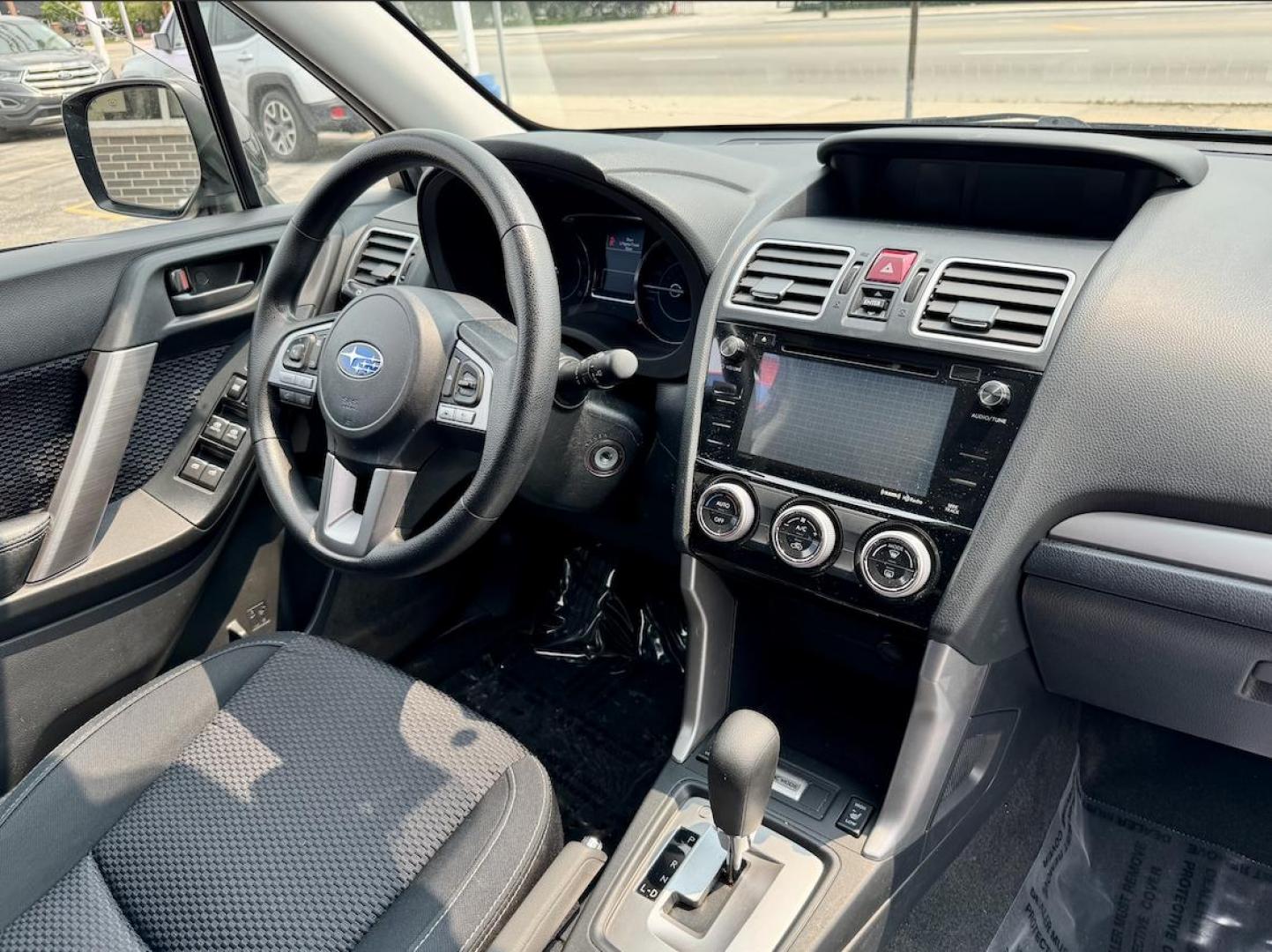2017 BLACK Subaru Forester 2.5i Premium PZEV CVT (JF2SJAGC2HH) with an 2.5L H4 SOHC 16V engine, CVT transmission, located at 7600 S Western Ave., Chicago, IL, 60620, (773) 918-3980, 0.000000, 0.000000 - Photo#8