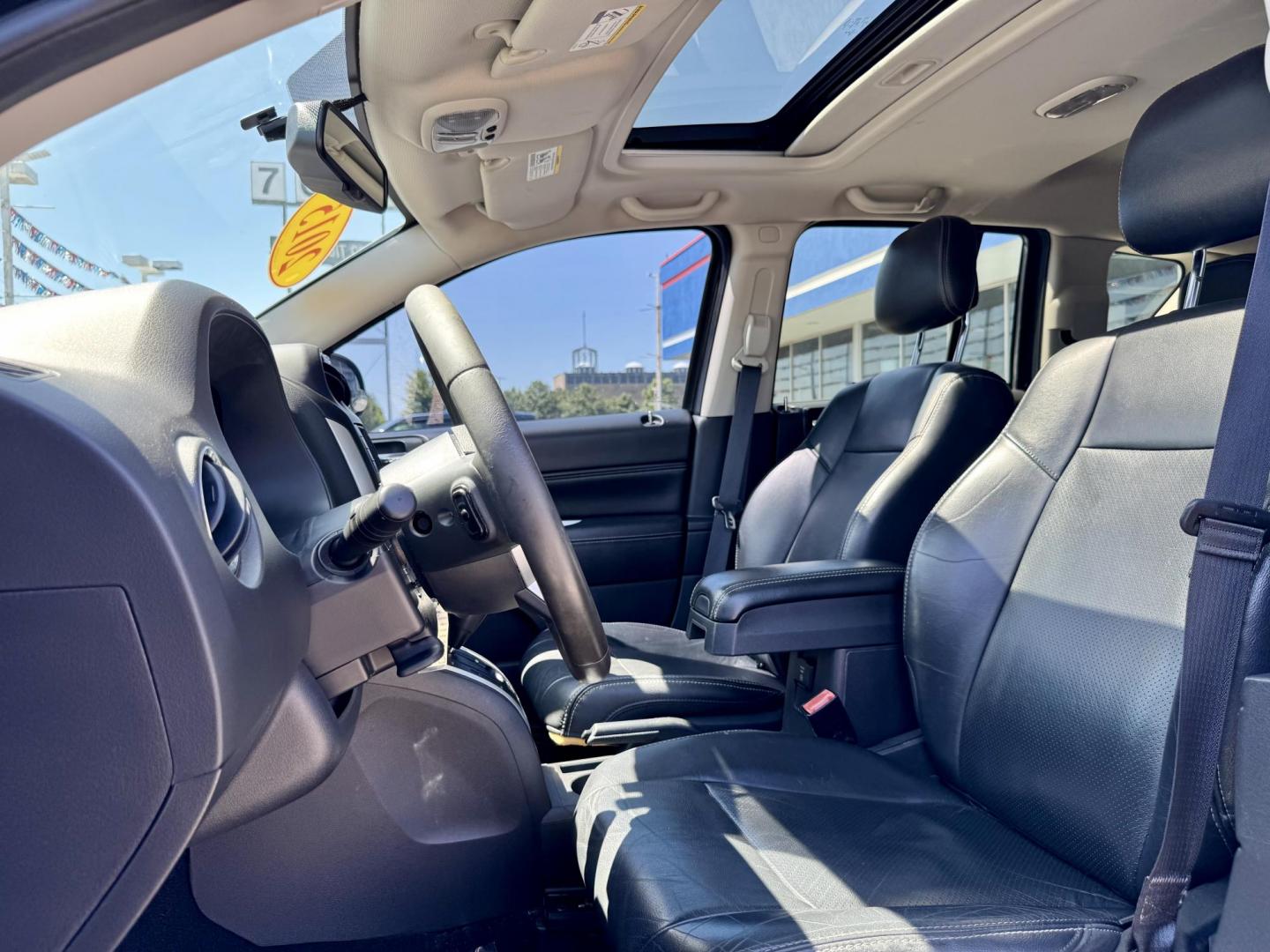 2015 BLACK Jeep Compass Latitude FWD (1C4NJCEAXFD) with an 2.0L L4 DOHC 16V engine, Continuously Variable Transmission transmission, located at 7600 S Western Ave., Chicago, IL, 60620, (773) 918-3980, 0.000000, 0.000000 - Photo#7