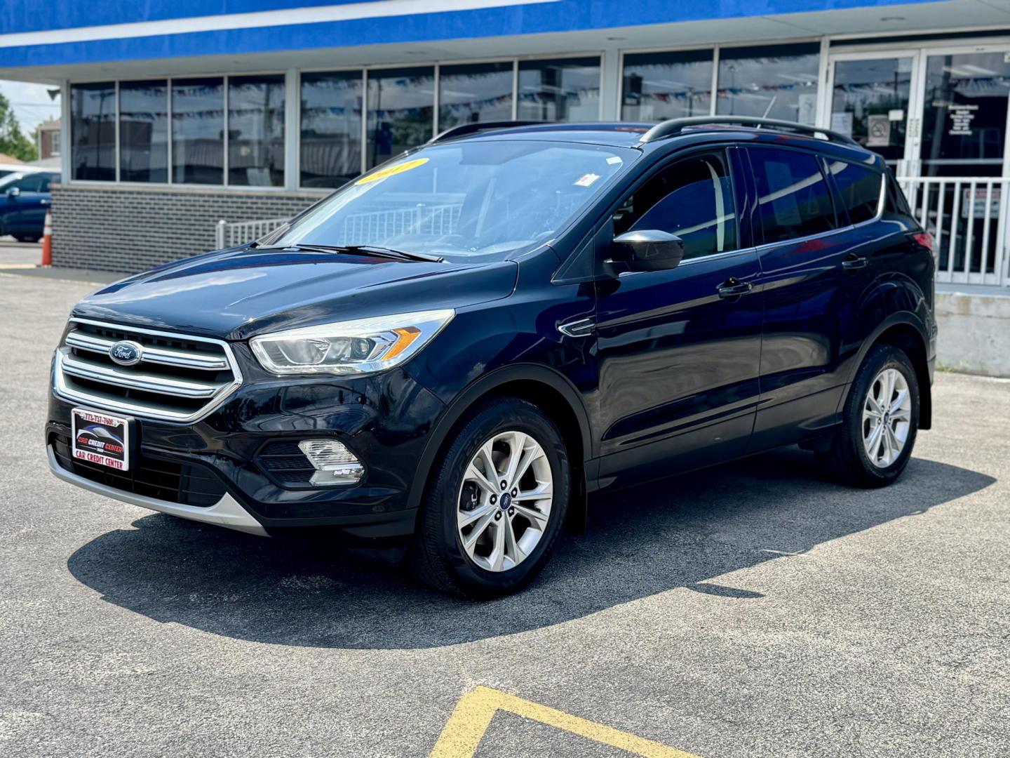 2017 BLACK Ford Escape SE 4WD (1FMCU9GD2HU) with an 1.5L L4 DOHC 16V engine, 6A transmission, located at 7600 S Western Ave., Chicago, IL, 60620, (773) 918-3980, 0.000000, 0.000000 - Photo#2