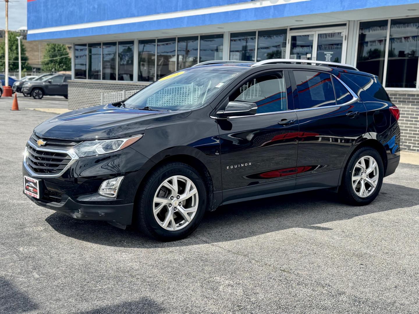 2018 BLACK Chevrolet Equinox LT 2WD (2GNAXKEX9J6) with an 2.0L L4 DOHC 16V HYBRID engine, 6A transmission, located at 7600 S Western Ave., Chicago, IL, 60620, (773) 918-3980, 0.000000, 0.000000 - Photo#2