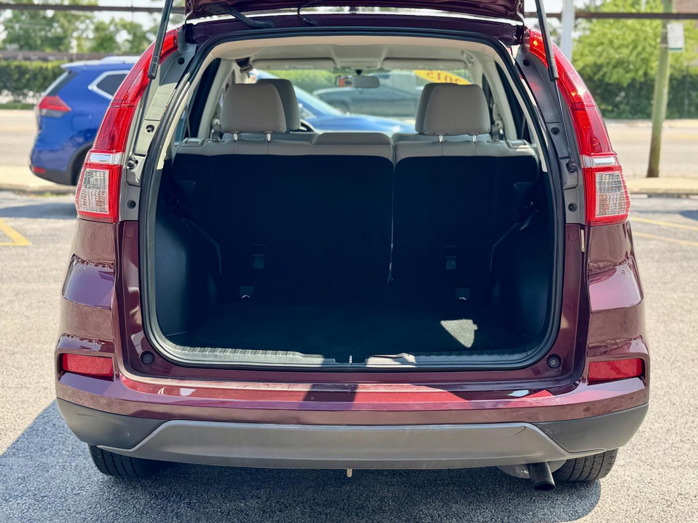 2015 RED Honda CR-V LX 4WD (5J6RM4H36FL) with an 2.4L L4 DOHC 16V engine, Continuously Variable Transmission transmission, located at 7600 S Western Ave., Chicago, IL, 60620, (773) 918-3980, 0.000000, 0.000000 - Photo#4