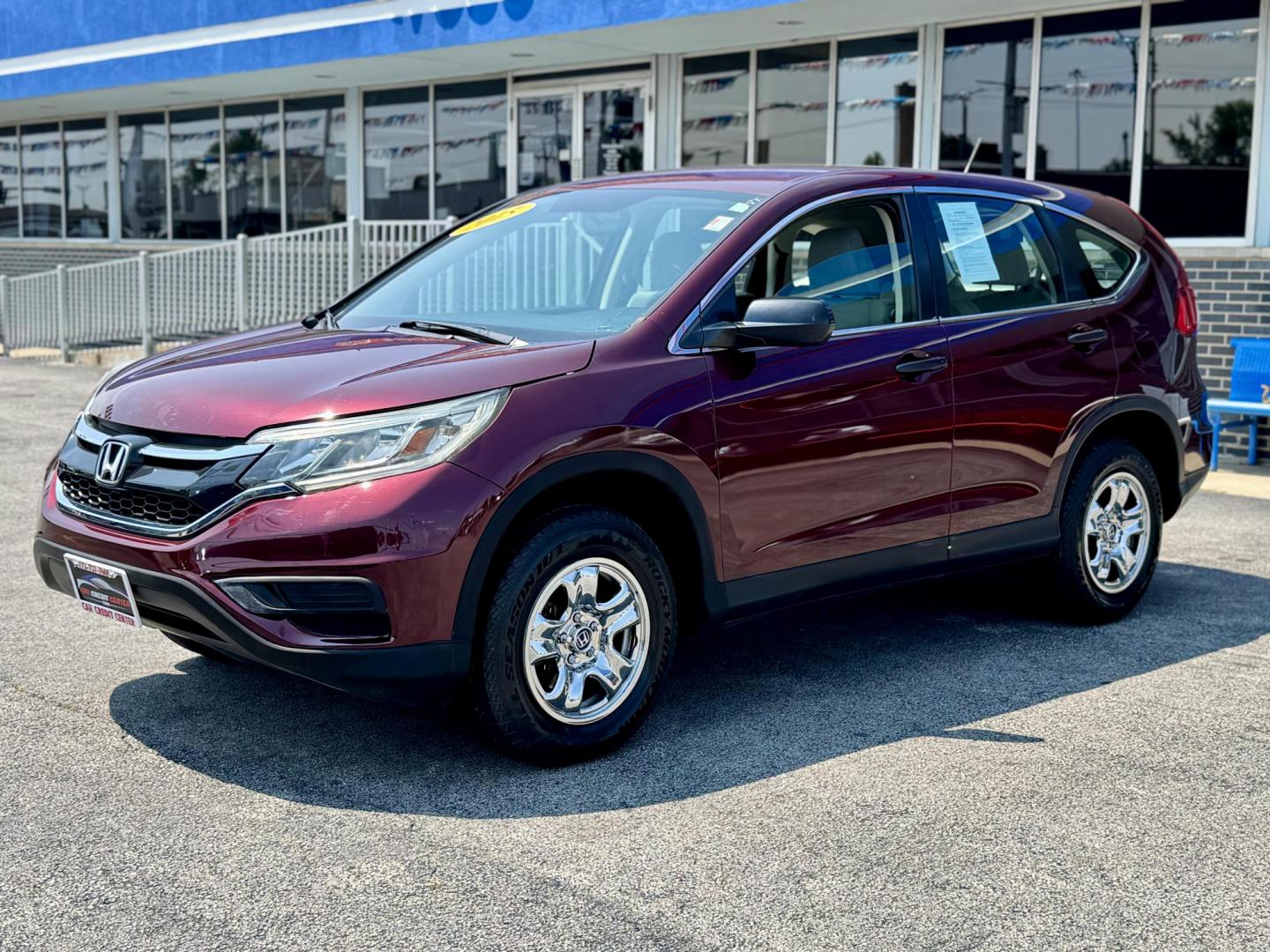 2015 RED Honda CR-V LX 4WD (5J6RM4H36FL) with an 2.4L L4 DOHC 16V engine, Continuously Variable Transmission transmission, located at 7600 S Western Ave., Chicago, IL, 60620, (773) 918-3980, 0.000000, 0.000000 - Photo#2
