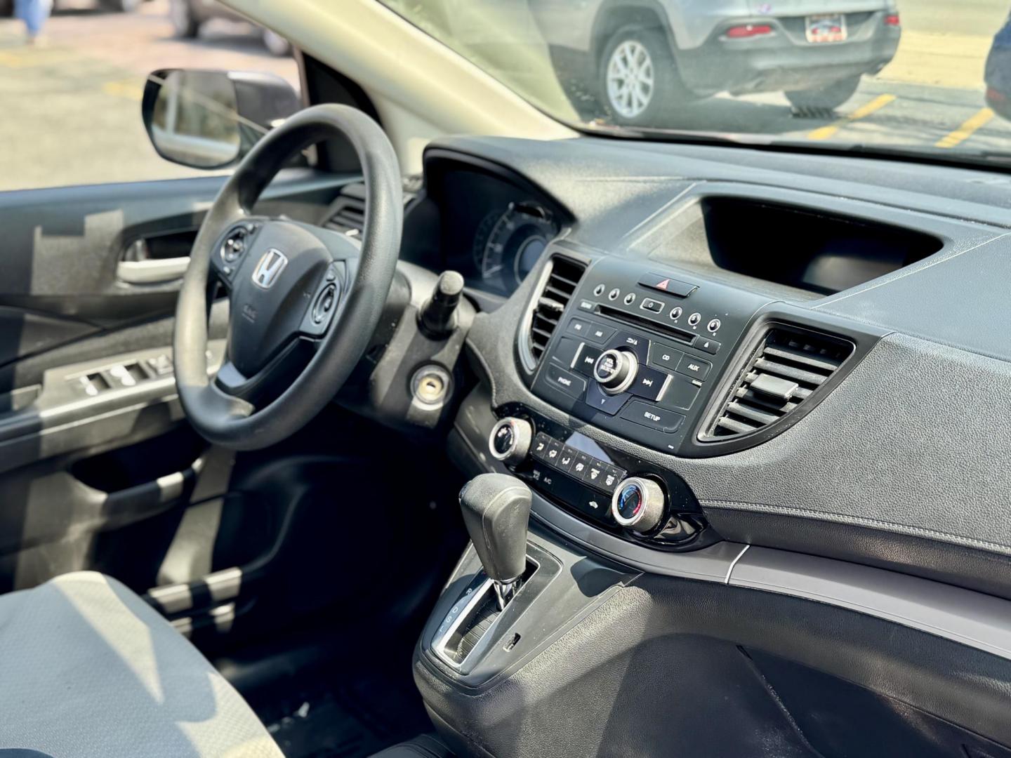 2015 RED Honda CR-V LX 4WD (5J6RM4H36FL) with an 2.4L L4 DOHC 16V engine, Continuously Variable Transmission transmission, located at 7600 S Western Ave., Chicago, IL, 60620, (773) 918-3980, 0.000000, 0.000000 - Photo#8