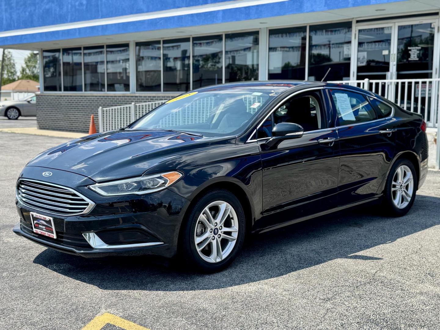 2018 BLACK Ford Fusion SE (3FA6P0HD1JR) with an 1.5L L4 DOHC 16V engine, 6A transmission, located at 7600 S Western Ave., Chicago, IL, 60620, (773) 918-3980, 0.000000, 0.000000 - Photo#2