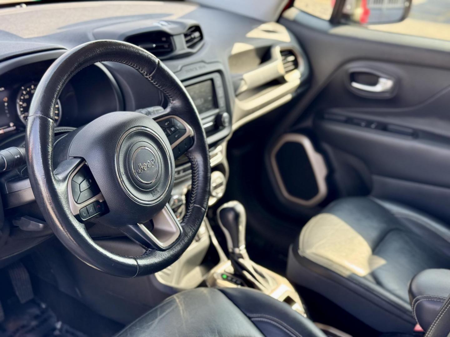 2015 RED Jeep Renegade Limited FWD (ZACCJADT5FP) with an 2.4L L4 engine, 9-Speed Automatic transmission, located at 7600 S Western Ave., Chicago, IL, 60620, (773) 918-3980, 0.000000, 0.000000 - Photo#5
