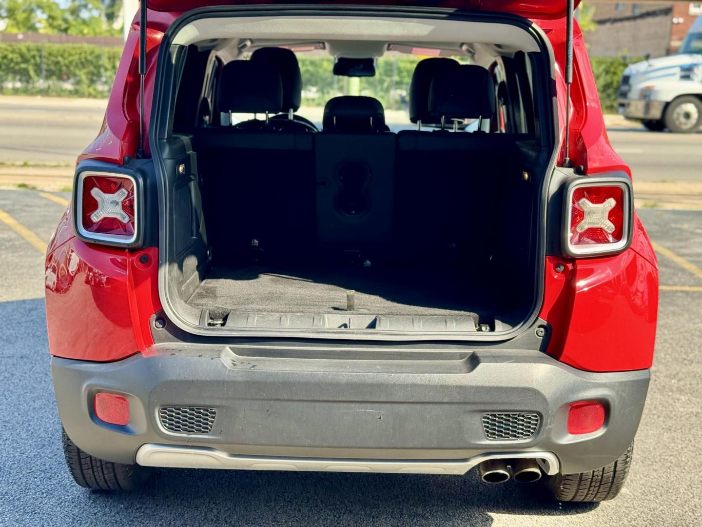 2015 RED Jeep Renegade Limited FWD (ZACCJADT5FP) with an 2.4L L4 engine, 9-Speed Automatic transmission, located at 7600 S Western Ave., Chicago, IL, 60620, (773) 918-3980, 0.000000, 0.000000 - Photo#4