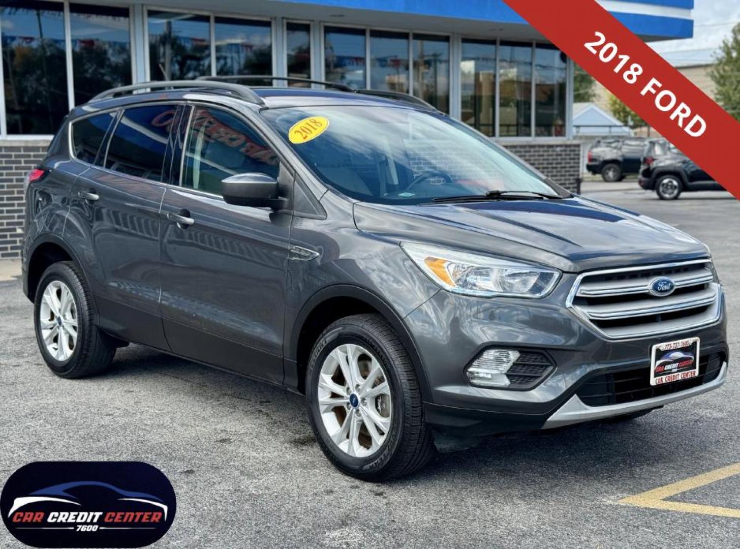2018 GREY Ford Escape SE 4WD (1FMCU9GD6JU) with an 1.5L L4 DOHC 16V engine, 6A transmission, located at 7600 S Western Ave., Chicago, IL, 60620, (773) 918-3980, 0.000000, 0.000000 - Photo#0