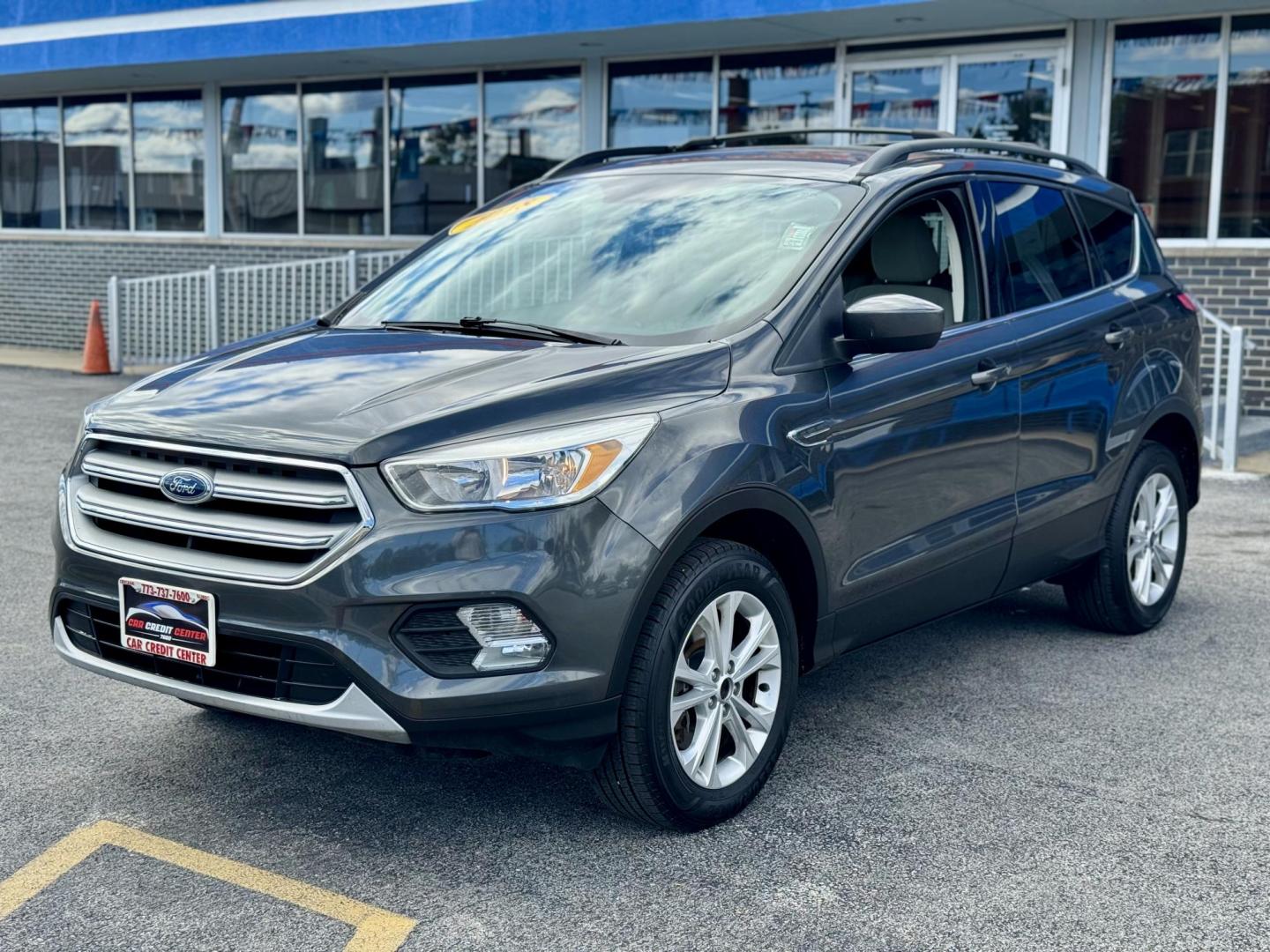 2018 GREY Ford Escape SE 4WD (1FMCU9GD6JU) with an 1.5L L4 DOHC 16V engine, 6A transmission, located at 7600 S Western Ave., Chicago, IL, 60620, (773) 918-3980, 0.000000, 0.000000 - Photo#2