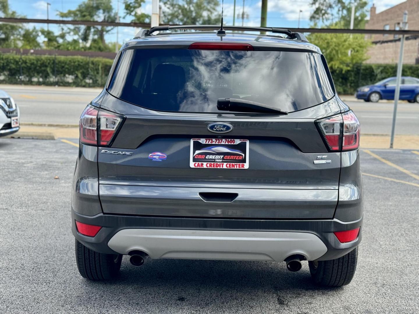 2018 GREY Ford Escape SE 4WD (1FMCU9GD6JU) with an 1.5L L4 DOHC 16V engine, 6A transmission, located at 7600 S Western Ave., Chicago, IL, 60620, (773) 918-3980, 0.000000, 0.000000 - Photo#3