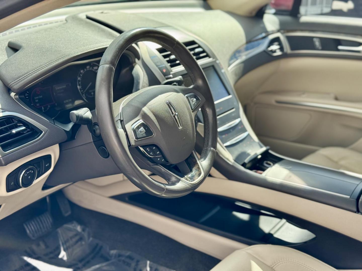 2016 RED Lincoln MKZ FWD (3LN6L2GK0GR) with an 3.7L V6 DOHC 24V engine, 6-Speed Automatic transmission, located at 7600 S Western Ave., Chicago, IL, 60620, (773) 918-3980, 0.000000, 0.000000 - Photo#5