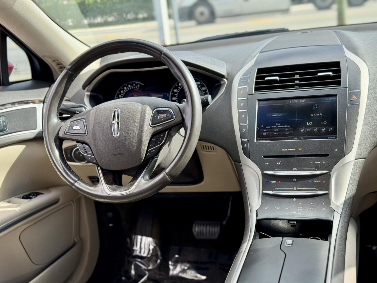 2016 RED Lincoln MKZ FWD (3LN6L2GK0GR) with an 3.7L V6 DOHC 24V engine, 6-Speed Automatic transmission, located at 7600 S Western Ave., Chicago, IL, 60620, (773) 918-3980, 0.000000, 0.000000 - Photo#6