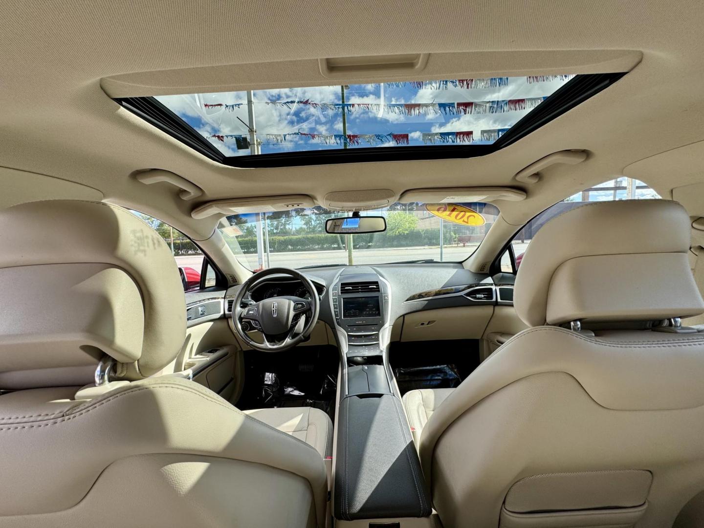 2016 RED Lincoln MKZ FWD (3LN6L2GK0GR) with an 3.7L V6 DOHC 24V engine, 6-Speed Automatic transmission, located at 7600 S Western Ave., Chicago, IL, 60620, (773) 918-3980, 0.000000, 0.000000 - Photo#9