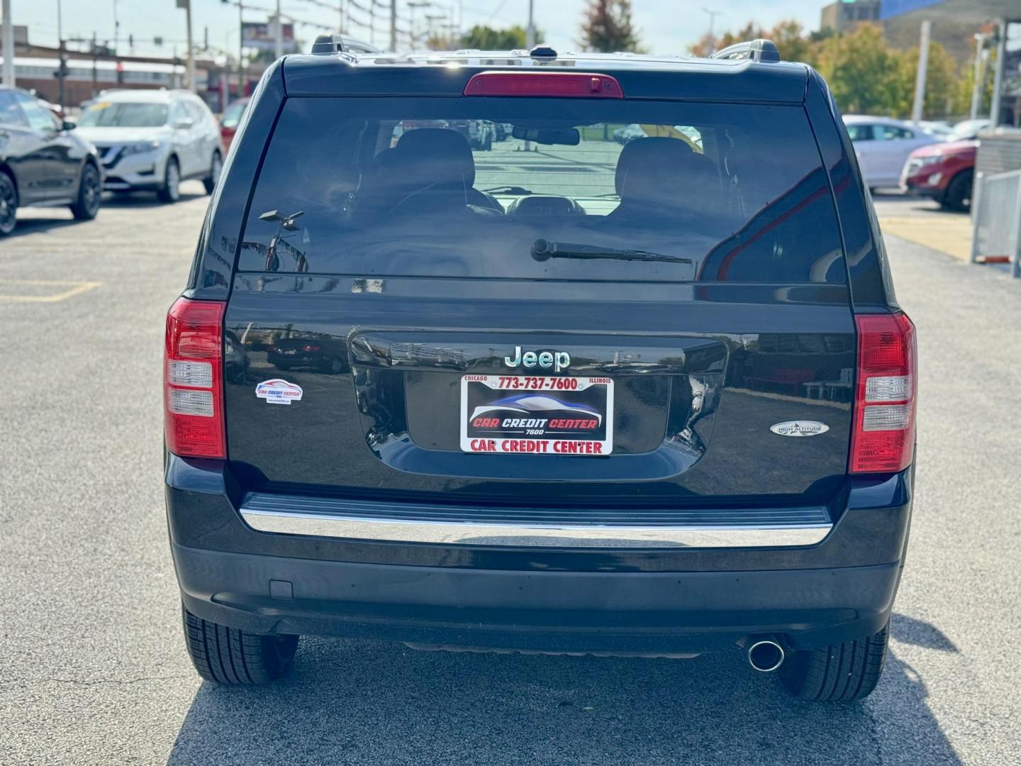 2017 BLACK Jeep Patriot Latitude 2WD (1C4NJPFA1HD) with an 2.0L L4 DOHC 16V engine, located at 7600 S Western Ave., Chicago, IL, 60620, (773) 918-3980, 0.000000, 0.000000 - Photo#2