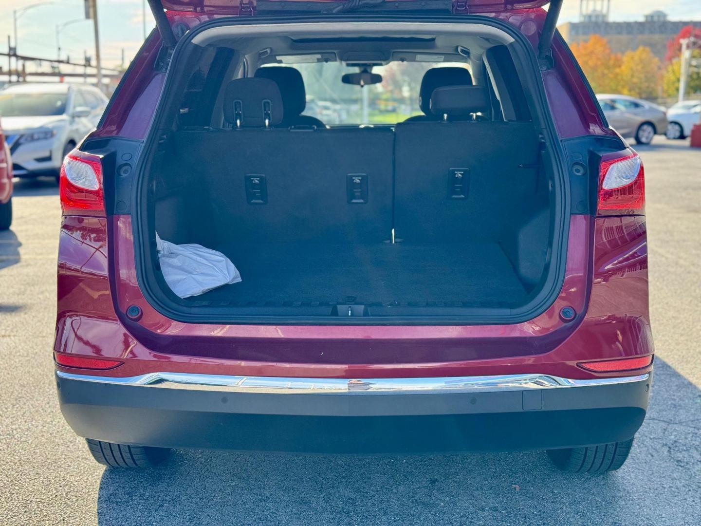 2018 RED Chevrolet Equinox LT 2WD (2GNAXJEV9J6) with an 1.5L L4 DIR DOHC 16V TURBO engine, 6A transmission, located at 7600 S Western Ave., Chicago, IL, 60620, (773) 918-3980, 0.000000, 0.000000 - Photo#4