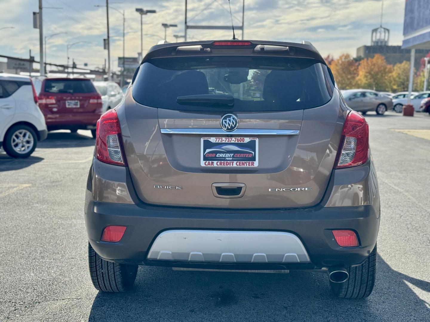 2016 BROWN Buick Encore Sport Touring FWD (KL4CJ1SM8GB) with an 1.4L L4 DOHC 16V TURBO engine, 6A transmission, located at 7600 S Western Ave., Chicago, IL, 60620, (773) 918-3980, 0.000000, 0.000000 - Photo#3