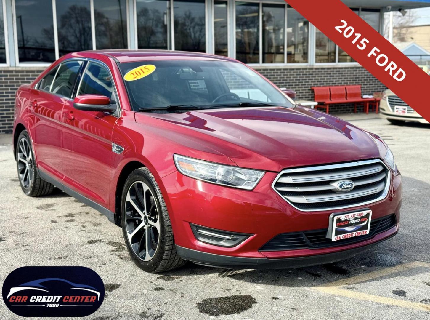 2015 RED Ford Taurus SEL FWD (1FAHP2E88FG) with an 3.5L V6 DOHC 24V engine, 6-Speed Automatic transmission, located at 7600 S Western Ave., Chicago, IL, 60620, (773) 918-3980, 0.000000, 0.000000 - Photo#0
