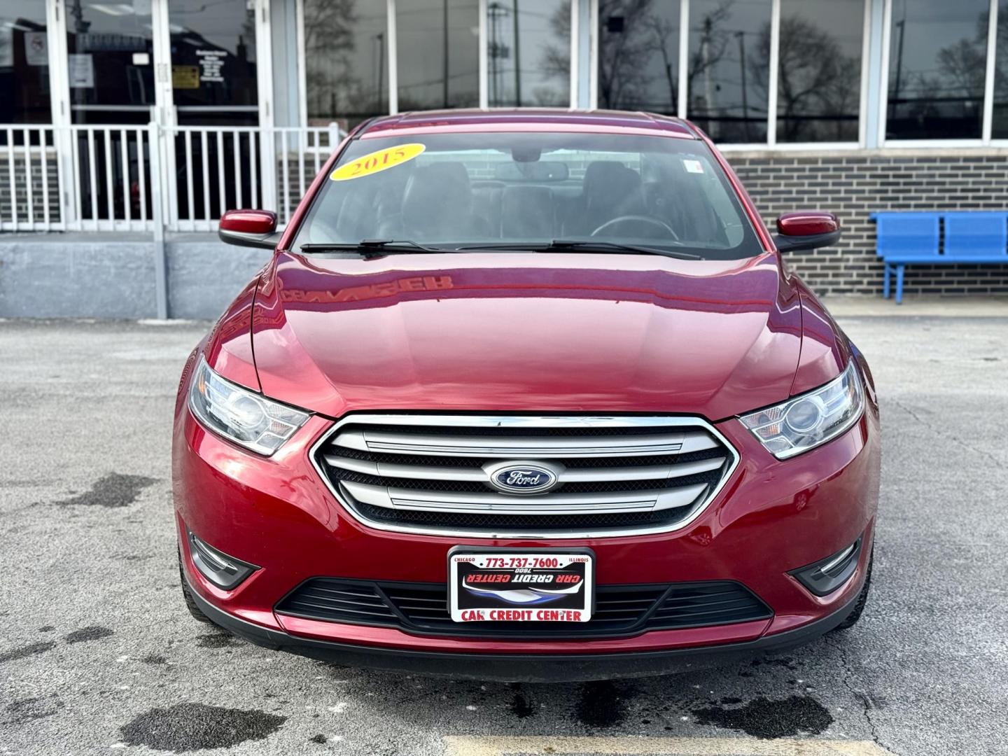2015 RED Ford Taurus SEL FWD (1FAHP2E88FG) with an 3.5L V6 DOHC 24V engine, 6-Speed Automatic transmission, located at 7600 S Western Ave., Chicago, IL, 60620, (773) 918-3980, 0.000000, 0.000000 - Photo#1