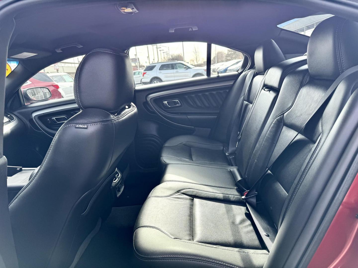 2015 RED Ford Taurus SEL FWD (1FAHP2E88FG) with an 3.5L V6 DOHC 24V engine, 6-Speed Automatic transmission, located at 7600 S Western Ave., Chicago, IL, 60620, (773) 918-3980, 0.000000, 0.000000 - Photo#8