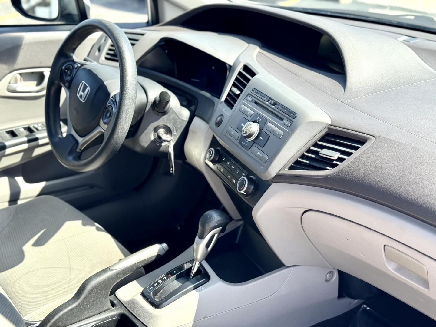 2012 BLUE Honda Civic LX Sedan 5-Speed AT (19XFB2F51CE) with an 1.8L L4 SOHC 16V engine, 5-Speed Automatic transmission, located at 7600 S Western Ave., Chicago, IL, 60620, (773) 918-3980, 0.000000, 0.000000 - Photo#10