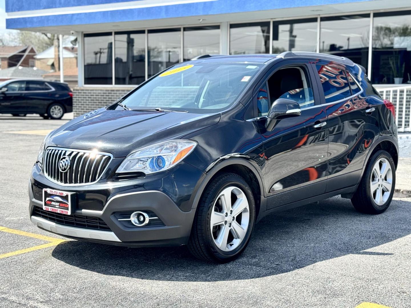 2015 BLACK Buick Encore Convenience FWD (KL4CJBSB9FB) with an 1.4L L4 DOHC 16V TURBO engine, 6-Speed Automatic transmission, located at 7600 S Western Ave., Chicago, IL, 60620, (773) 918-3980, 0.000000, 0.000000 - Photo#2