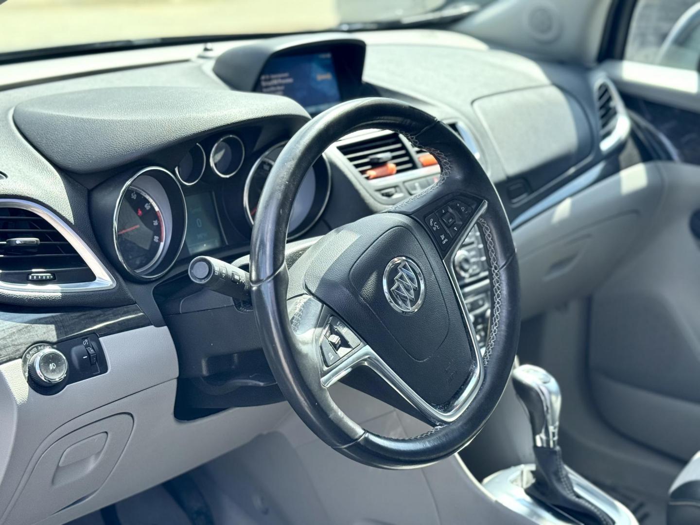 2015 BLACK Buick Encore Convenience FWD (KL4CJBSB9FB) with an 1.4L L4 DOHC 16V TURBO engine, 6-Speed Automatic transmission, located at 7600 S Western Ave., Chicago, IL, 60620, (773) 918-3980, 0.000000, 0.000000 - Photo#5