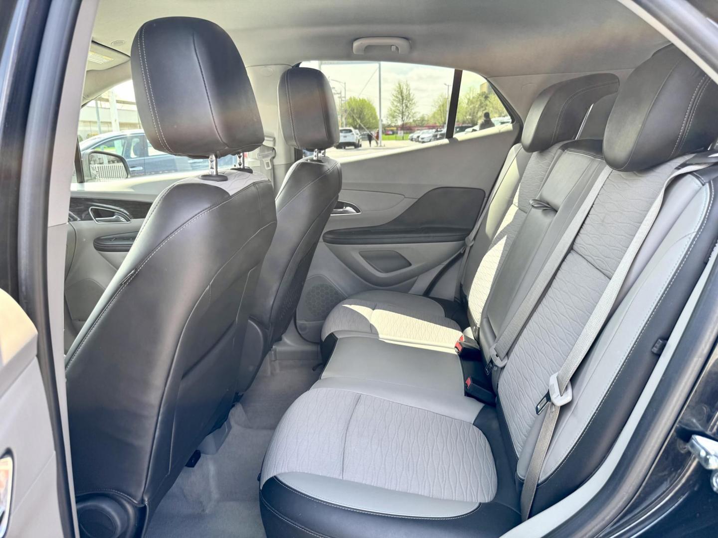 2015 BLACK Buick Encore Convenience FWD (KL4CJBSB9FB) with an 1.4L L4 DOHC 16V TURBO engine, 6-Speed Automatic transmission, located at 7600 S Western Ave., Chicago, IL, 60620, (773) 918-3980, 0.000000, 0.000000 - Photo#8