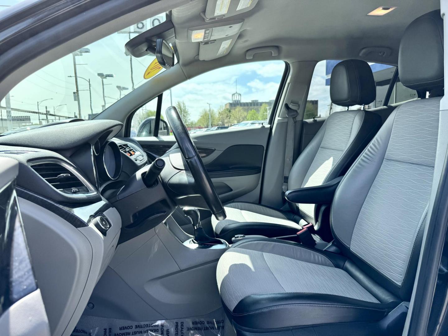 2015 BLACK Buick Encore Convenience FWD (KL4CJBSB9FB) with an 1.4L L4 DOHC 16V TURBO engine, 6-Speed Automatic transmission, located at 7600 S Western Ave., Chicago, IL, 60620, (773) 918-3980, 0.000000, 0.000000 - Photo#7