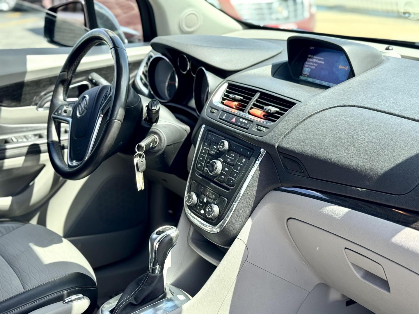 2015 BLACK Buick Encore Convenience FWD (KL4CJBSB9FB) with an 1.4L L4 DOHC 16V TURBO engine, 6-Speed Automatic transmission, located at 7600 S Western Ave., Chicago, IL, 60620, (773) 918-3980, 0.000000, 0.000000 - Photo#10