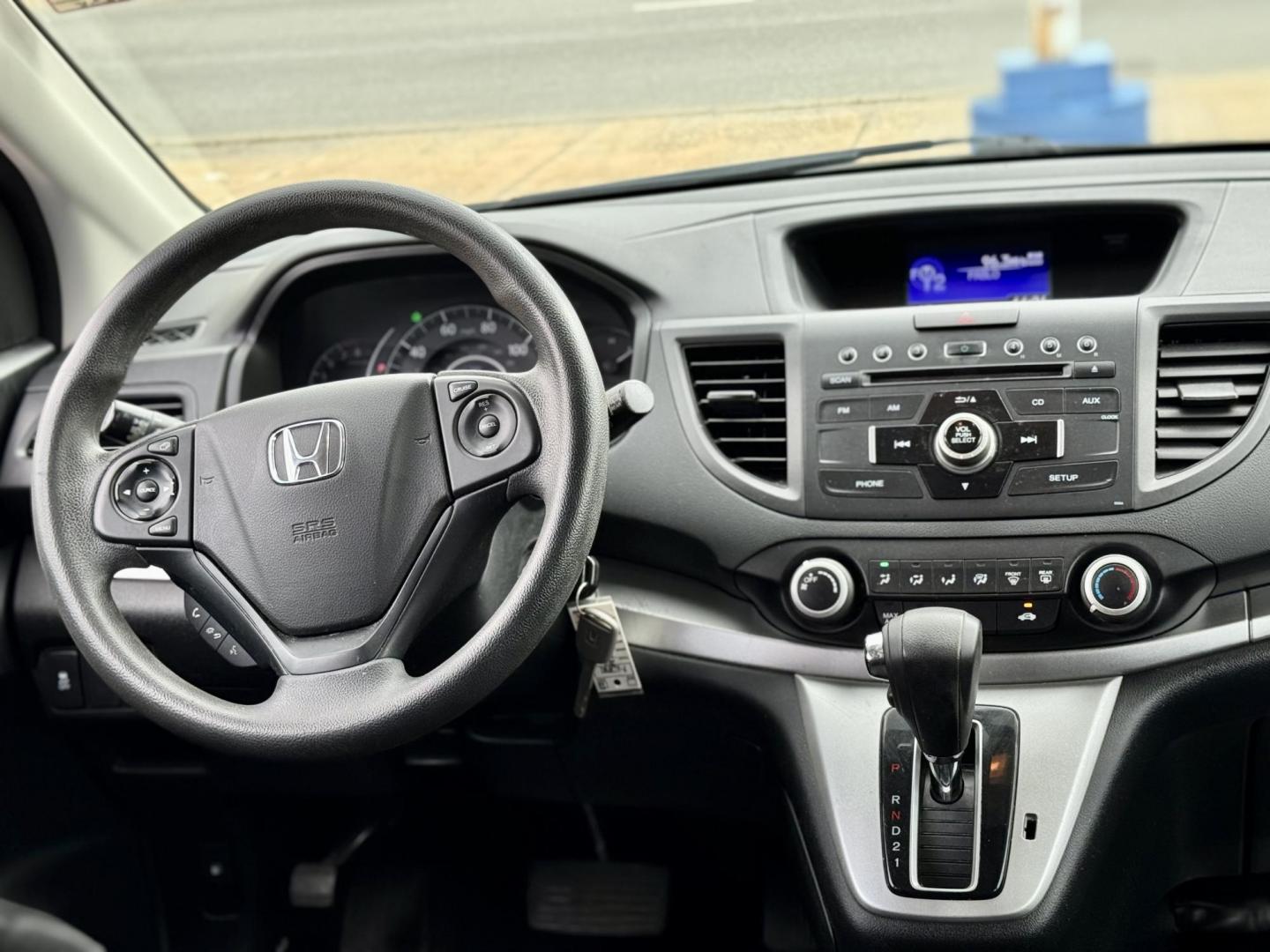 2014 TEAL Honda CR-V LX 4WD 5-Speed AT (5J6RM4H39EL) with an 2.4L L4 DOHC 16V engine, 5-Speed Automatic transmission, located at 7600 S Western Ave., Chicago, IL, 60620, (773) 918-3980, 0.000000, 0.000000 - Photo#9