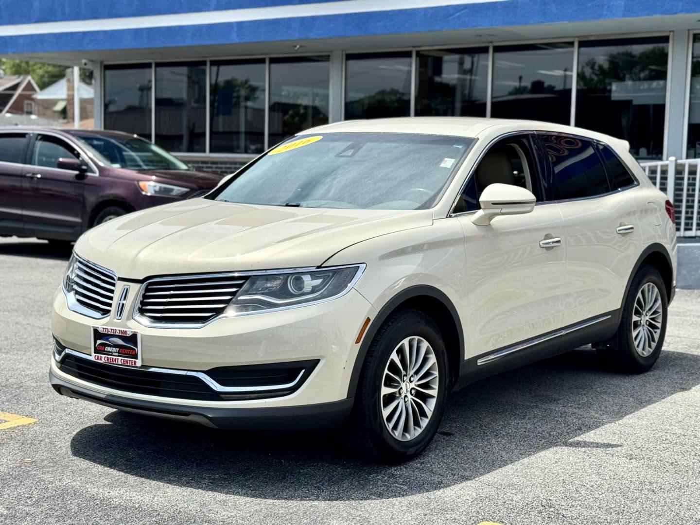 2016 GOLD Lincoln MKX Select AWD (2LMTJ8KR0GB) with an 3.7L V6 DOHC 24V engine, 6A transmission, located at 7600 S Western Ave., Chicago, IL, 60620, (773) 918-3980, 0.000000, 0.000000 - Photo#2