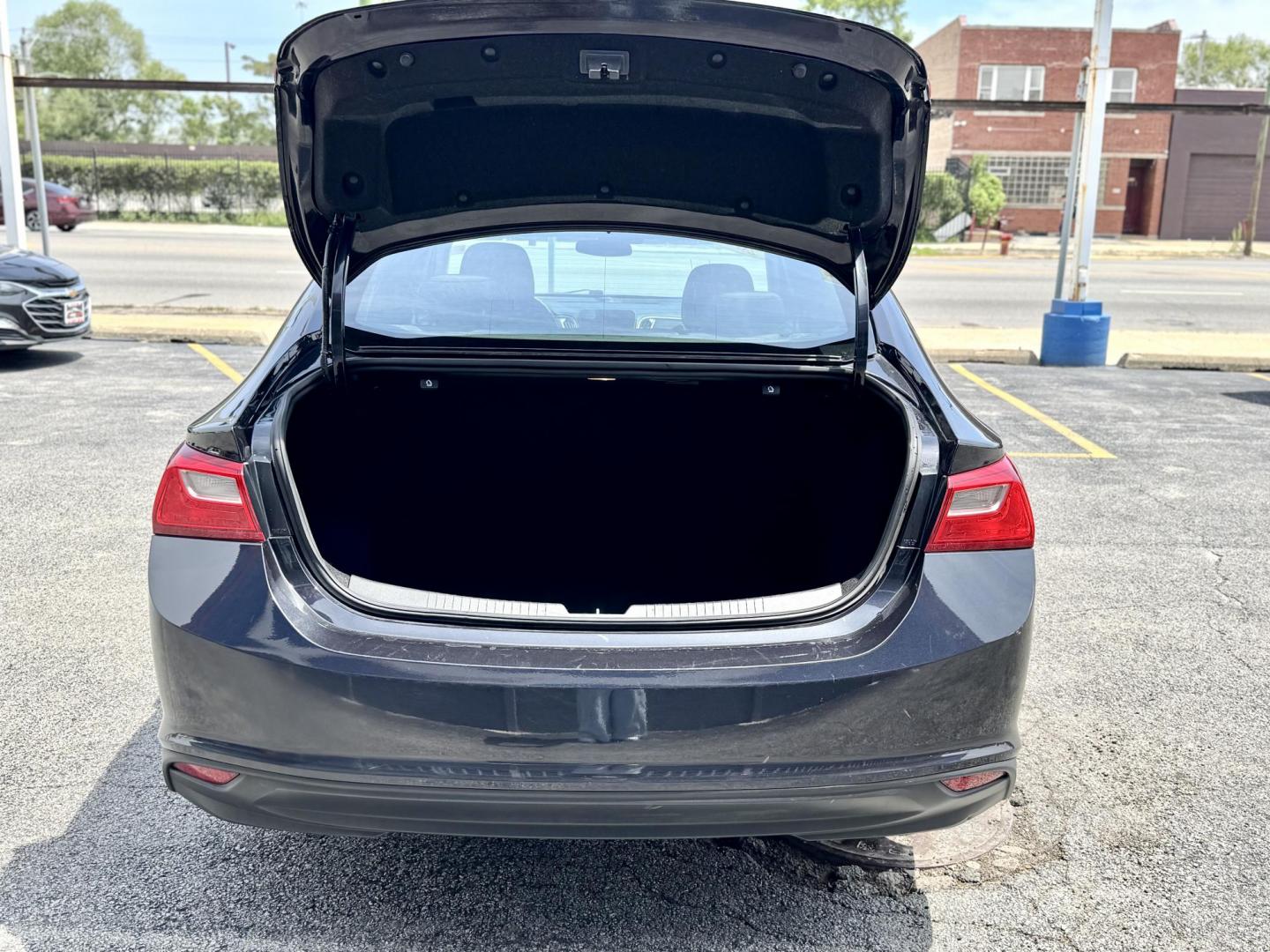 2023 GRAY Chevrolet Malibu 1LT (1G1ZD5ST2PF) with an 1.5L L4 DOHC 16V engine, 6A transmission, located at 7600 S Western Ave., Chicago, IL, 60620, (773) 918-3980, 0.000000, 0.000000 - Photo#4