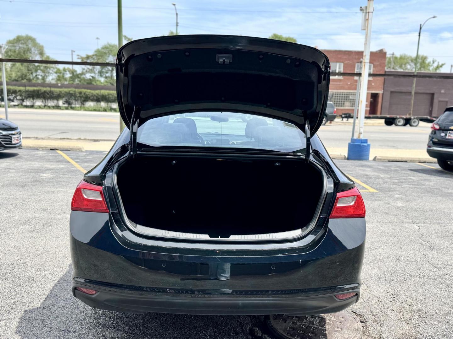 2023 BLACK Chevrolet Malibu 1LT (1G1ZD5ST5PF) with an 1.5L L4 DOHC 16V engine, 6A transmission, located at 7600 S Western Ave., Chicago, IL, 60620, (773) 918-3980, 0.000000, 0.000000 - Photo#4