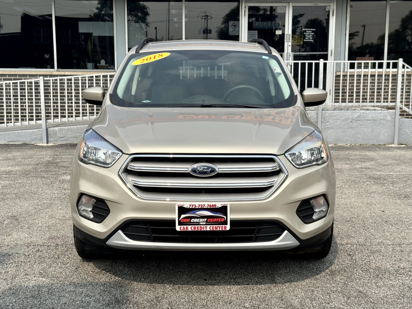 2018 GOLD Ford Escape SE FWD (1FMCU0GD4JU) with an 1.5L L4 DOHC 16V engine, 6A transmission, located at 7600 S Western Ave., Chicago, IL, 60620, (773) 918-3980, 0.000000, 0.000000- Photo#2