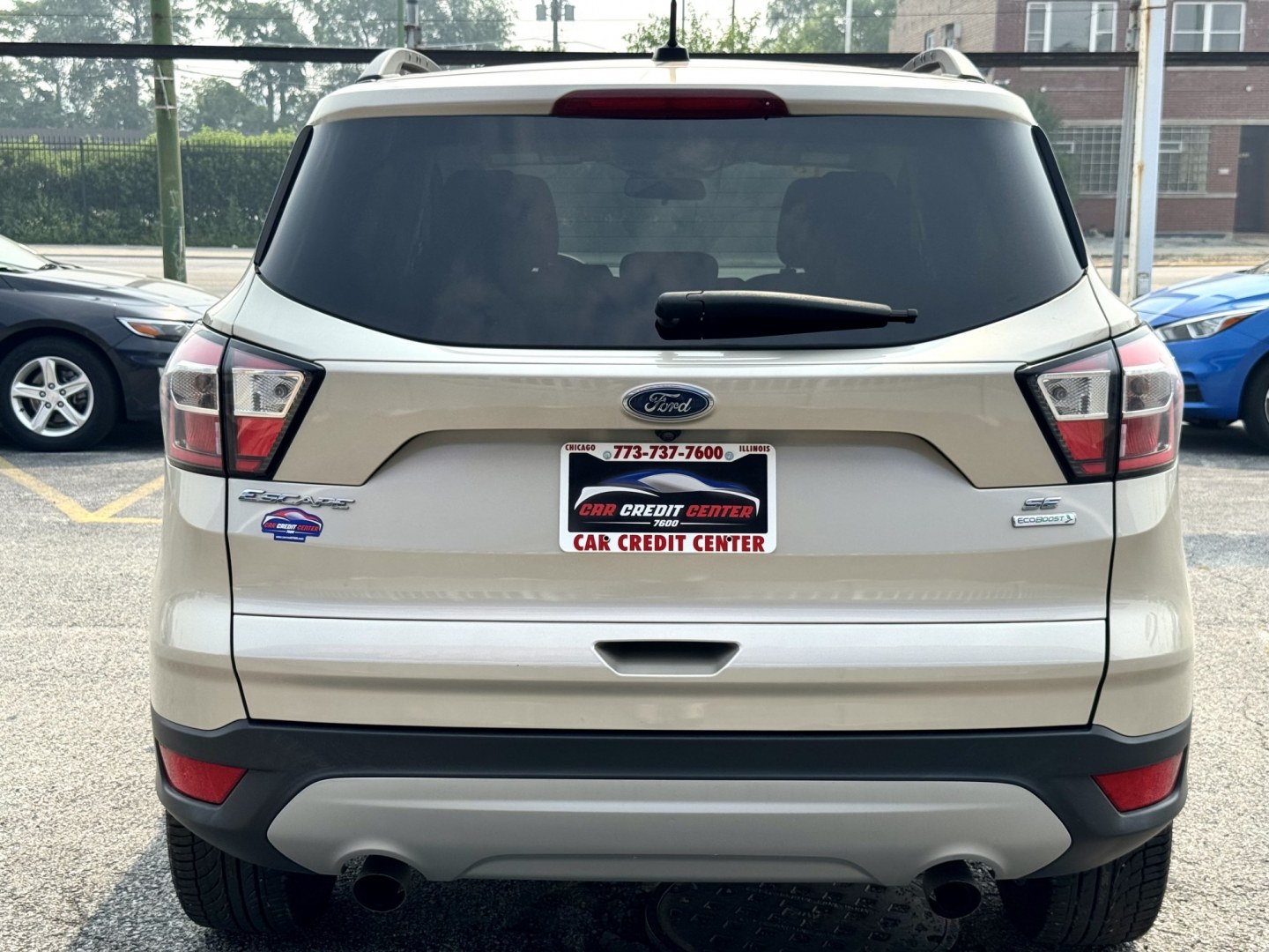 2018 GOLD Ford Escape SE FWD (1FMCU0GD4JU) with an 1.5L L4 DOHC 16V engine, 6A transmission, located at 7600 S Western Ave., Chicago, IL, 60620, (773) 918-3980, 0.000000, 0.000000- Photo#4