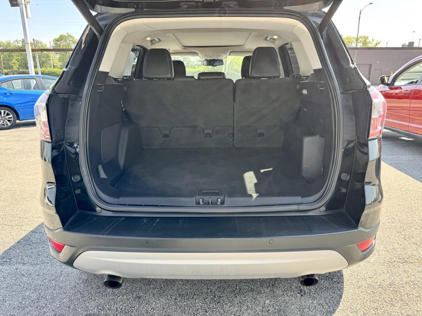 2018 BLACK Ford Escape Titanium FWD (1FMCU0J96JU) with an 2.0L L4 DOHC 16V engine, 6A transmission, located at 7600 S Western Ave., Chicago, IL, 60620, (773) 918-3980, 0.000000, 0.000000- Photo#4