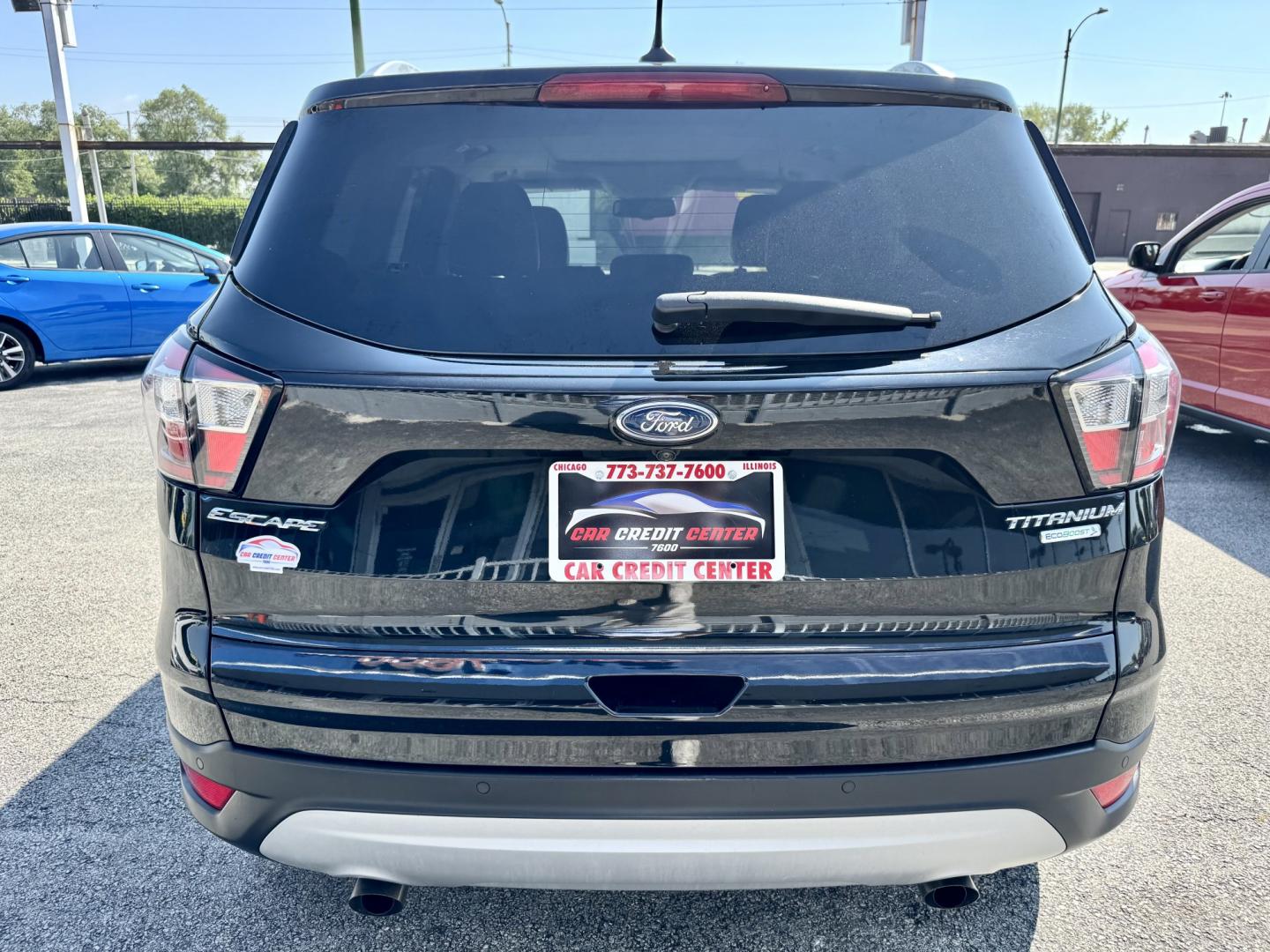 2018 BLACK Ford Escape Titanium FWD (1FMCU0J96JU) with an 2.0L L4 DOHC 16V engine, 6A transmission, located at 7600 S Western Ave., Chicago, IL, 60620, (773) 918-3980, 0.000000, 0.000000- Photo#3